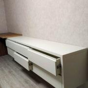 Купить тумбу ТВ подвесную с выдвижными ящиками и приставным консольным столиком в Донецке